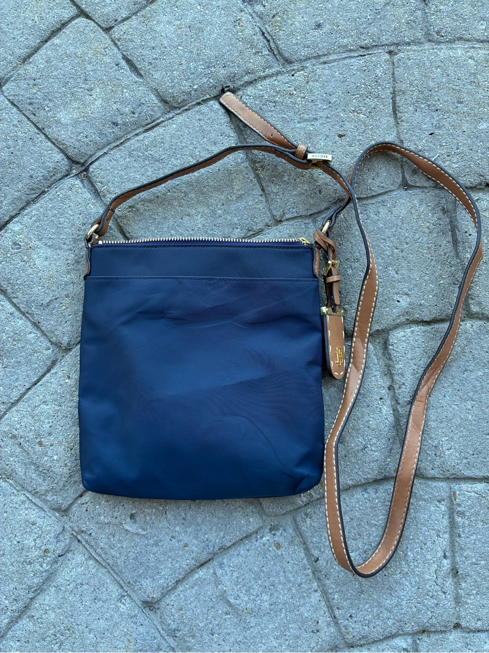 Tommy Hilfiger Julia
Smooth Nylon Crossbody
Bag Navy Blue; adjustable tan strap